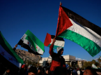 Palestinsk flagga vajar vid WHO efter symbolisk omröstning