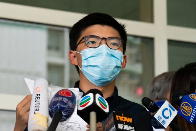 Joshua Wong står åtalad för ny nationell säkerhet i Hongkong