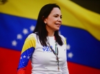 Venezuelas Machado s&auml;ger att hon kommer att &aring;terv&auml;nda hem och driva p&aring; f&ouml;r ett nytt val