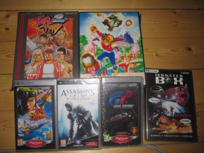 2 Neo Geo Aes och 3 PSP spel köpta